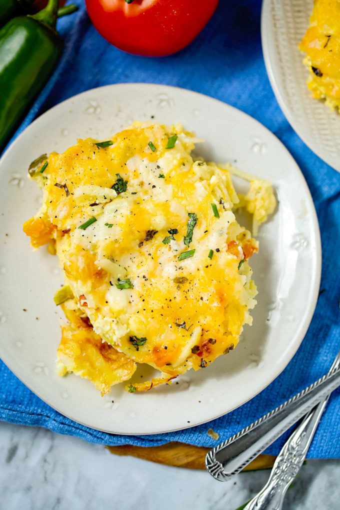 Serving of hashbrown casserole on white plate