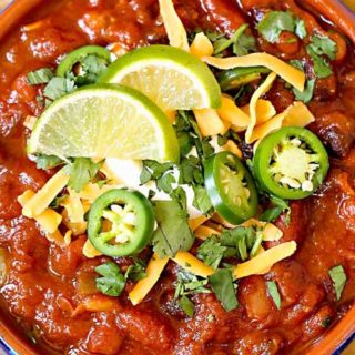 Incredibly flavorful and hearty, this 3 bean chili is made in the Instant Pot and ready in no time! Vegetarian chili is perfect for game day, tailgating, and weeknight dinners! #chili #vegetarian #instantpot #crockpot #slowcooker #beans #party #gameday