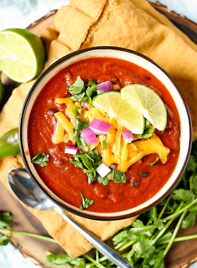 bowl of 3 bean vegetarian chili with toppings