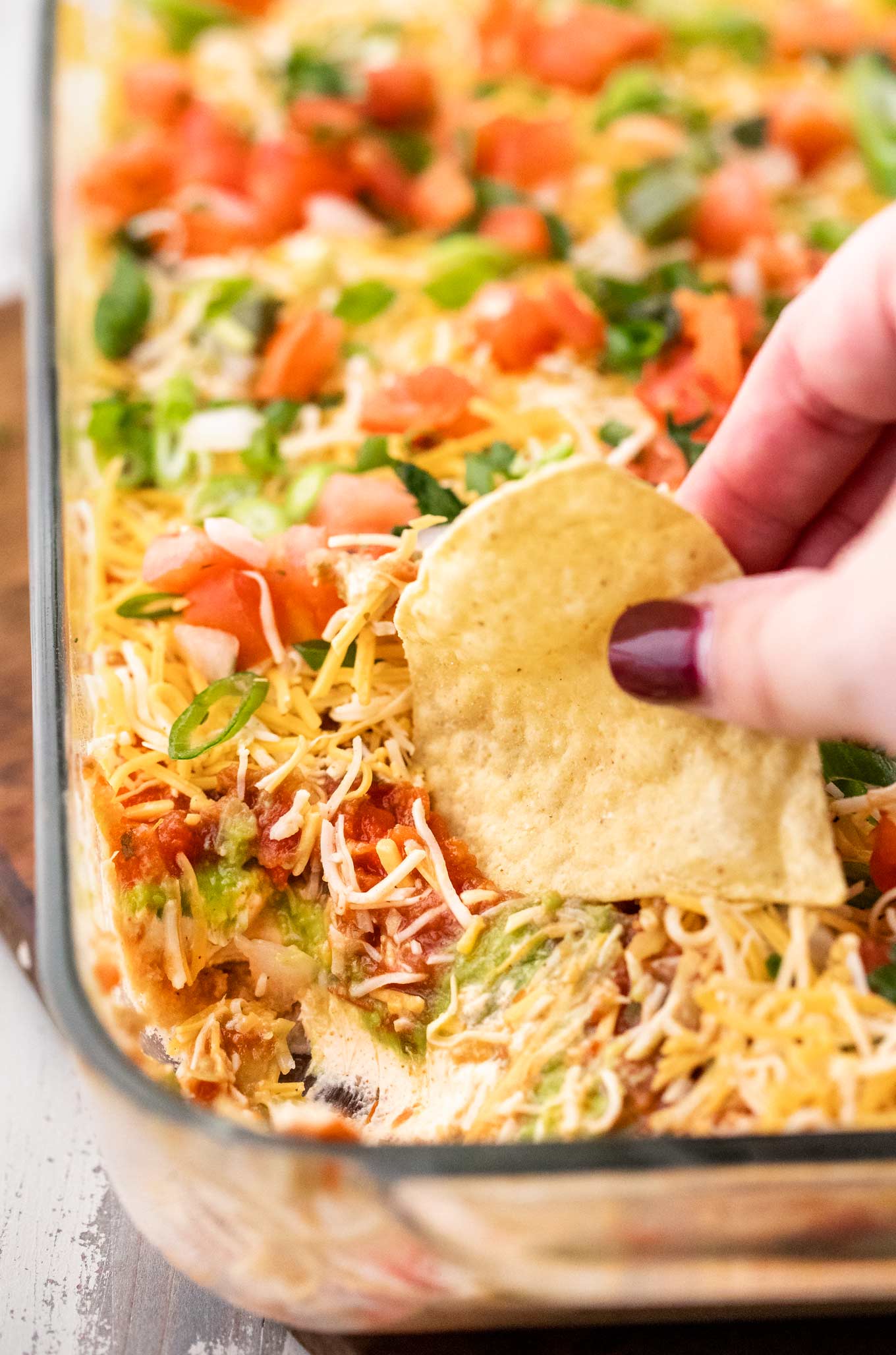 Mexican Fiesta 7 Layer Dip (make-ahead!) - The Chunky Chef