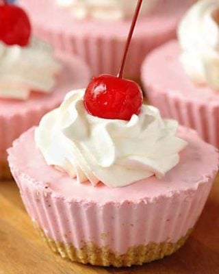 Rich and easy to make, this individual no-bake cherry cheesecake recipe is perfect for beginners and experts alike. Just 8 simple, common ingredients, and about 10 minutes of hands-on work! #cheesecake #nobake #dessert #cherry #minidessert #individualdessert #party #easydessert