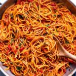 The best thing to happen to easy weeknight dinner - One Pot Spaghetti!  The pasta cooks IN the homemade sauce, so it absorbs every bit of flavor possible, leaving you with only one pot to wash and dinner ready in 30 minutes! #spaghetti #italian #pasta #dinner #easyrecipe #weeknightmeal #onepot #onepan