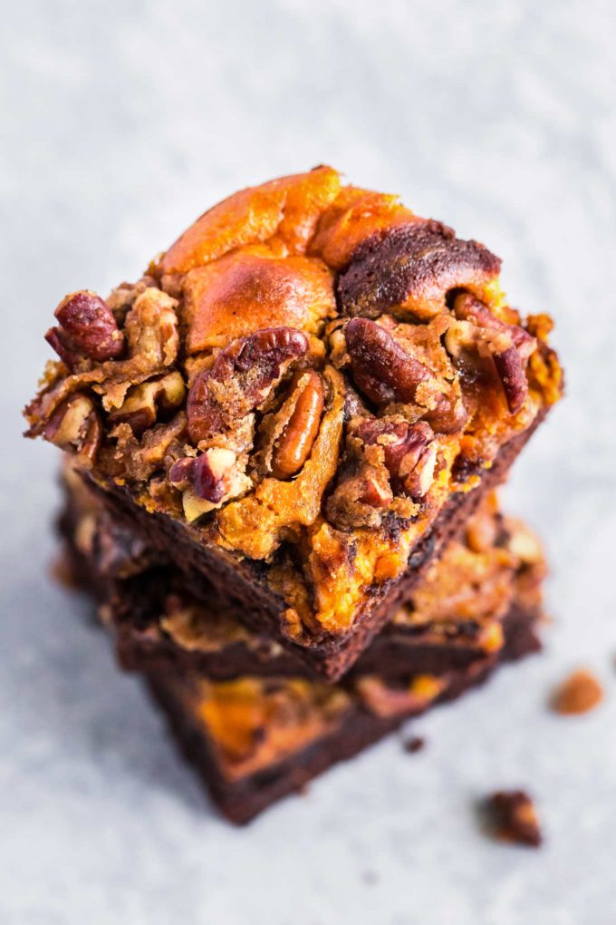 Stack of pumpkin cheesecake brownies