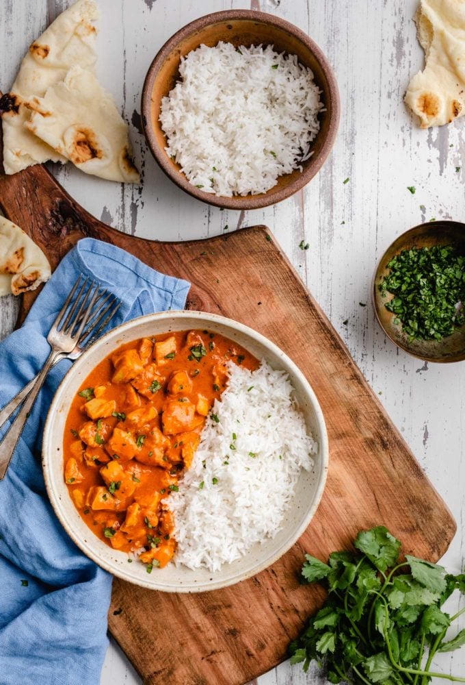 This Slow Cooker Chicken Tikka Masala is the easy homemade version of your Indian food-loving dreams!  Bold and flavorful, yet with a fraction of the work! #chickentikka #tikkamasala #curry #indianfood #slowcooker #crockpot #easyrecipe