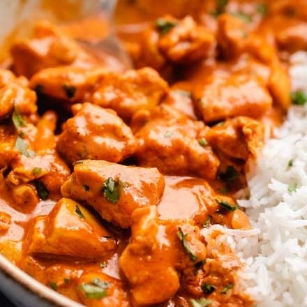 This Slow Cooker Chicken Tikka Masala is the easy homemade version of your Indian food-loving dreams!  Bold and flavorful, yet with a fraction of the work! #chickentikka #tikkamasala #curry #indianfood #slowcooker #crockpot #easyrecipe