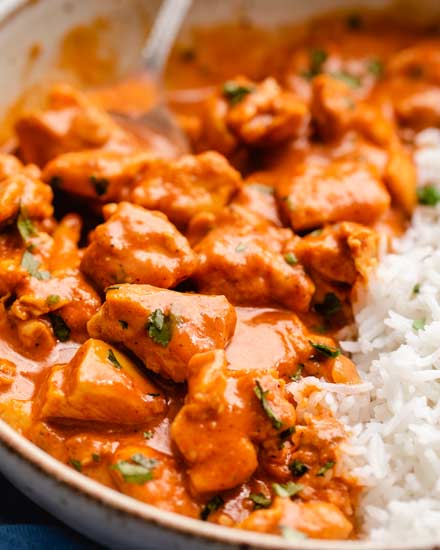 This Slow Cooker Chicken Tikka Masala is the easy homemade version of your Indian food-loving dreams!  Bold and flavorful, yet with a fraction of the work! #chickentikka #tikkamasala #curry #indianfood #slowcooker #crockpot #easyrecipe