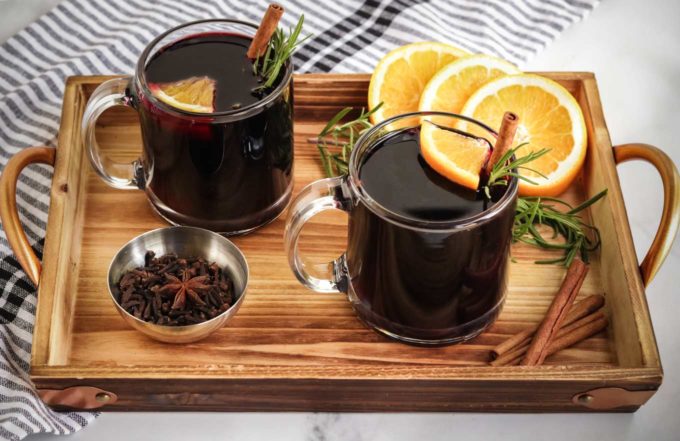 Mulled wine in glasses on serving tray