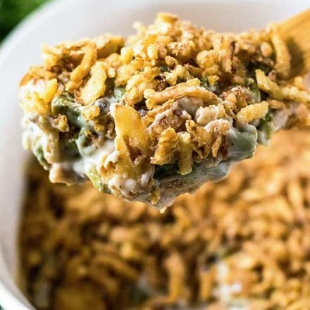 This green bean casserole is the classic holiday side dish everyone wants to see on the Thanksgiving table! Comforting, and SO easy to make... plus it's great to make ahead of time, making your holiday less stressful! #greenbean #casserole #Thanksgiving #sidedish #holiday #makeahead #easyrecipe