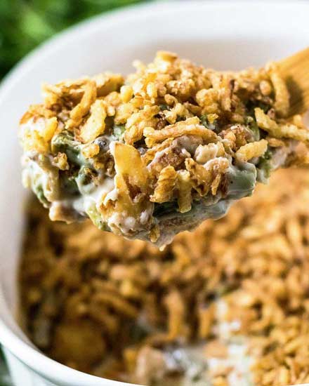 This green bean casserole is the classic holiday side dish everyone wants to see on the Thanksgiving table! Comforting, and SO easy to make... plus it's great to make ahead of time, making your holiday less stressful! #greenbean #casserole #Thanksgiving #sidedish #holiday #makeahead #easyrecipe