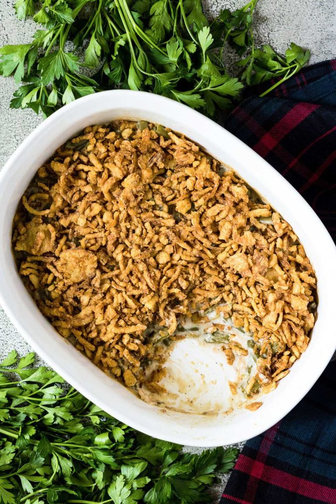 This green bean casserole is the classic holiday side dish everyone wants to see on the Thanksgiving table! Comforting, and SO easy to make... plus it's great to make ahead of time, making your holiday less stressful! #greenbean #casserole #Thanksgiving #sidedish #holiday #makeahead #easyrecipe