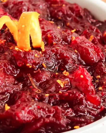 Easy and classic cranberry sauce, made from scratch in just 20 minutes and with only 4 ingredients!  Perfect with roasted turkey and on leftover sandwiches too! #cranberry #sauce #holiday #thanksgiving #sidedish #condiment #fromscratch #easyrecipe