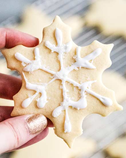 These cut out sugar cookies are delicious, have slightly crispy edges and soft centers, keep their shape, and they have perfect edges every single time!  The only sugar cookie recipe you'll need! #sugarcookie #cutoutcookies #dessert #easyrecipe #makeahead #christmascookie #christmas #holiday #baking