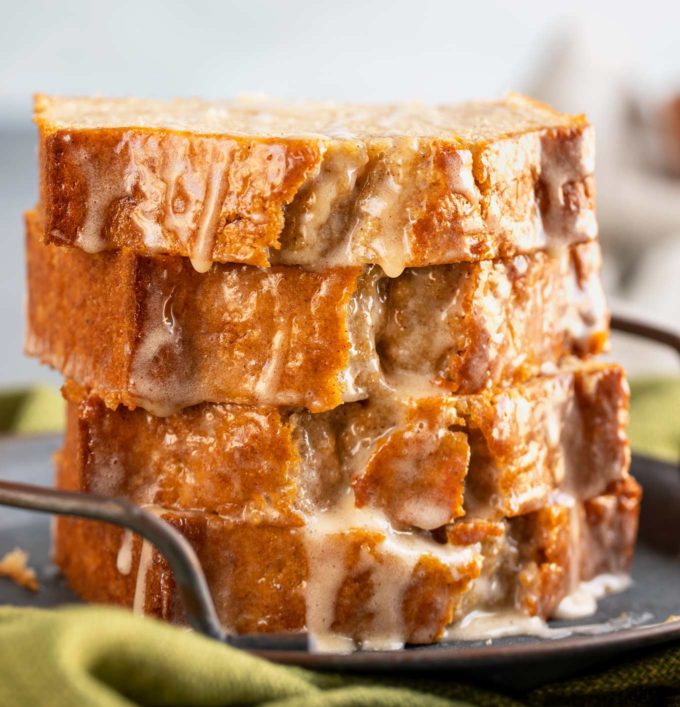 Eggnog bread slices stacked on top of each other