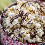 Chocolate covered popcorn in gift tin