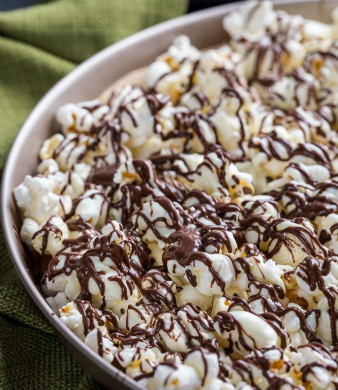 Chocolate covered popcorn in baking sheet