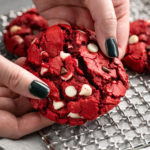 These Red Velvet Cake Mix Cookies are made using just 4 simple ingredients, and are on the cooling rack in 20 minutes - including prep time!  Great for Valentine's Day or when you need a quick dessert. #redvelvet #cakemix #cookies #baking #dessert #dessertrecipe #easyrecipe #valentinesday