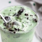 This Copycat Oreo Shamrock McFlurry is the homemade version of the McDonald's new St. Patrick's Day frozen treat.  Made with simple ingredients, you can have this minty treat in about 5 minutes... any time you want! #milkshake #mint #oreo #mcflurry #mcdonalds #icecream #copycat #easyrecipe #dessert #stpatricksday #stpattysday #irish