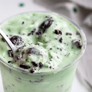 This Copycat Oreo Shamrock McFlurry is the homemade version of the McDonald's new St. Patrick's Day frozen treat. Made with simple ingredients, you can have this minty treat in about 5 minutes... any time you want! #milkshake #mint #oreo #mcflurry #mcdonalds #icecream #copycat #easyrecipe #dessert #stpatricksday #stpattysday #irish