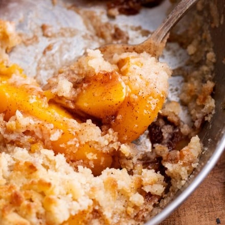 Scoop of peaches in skillet