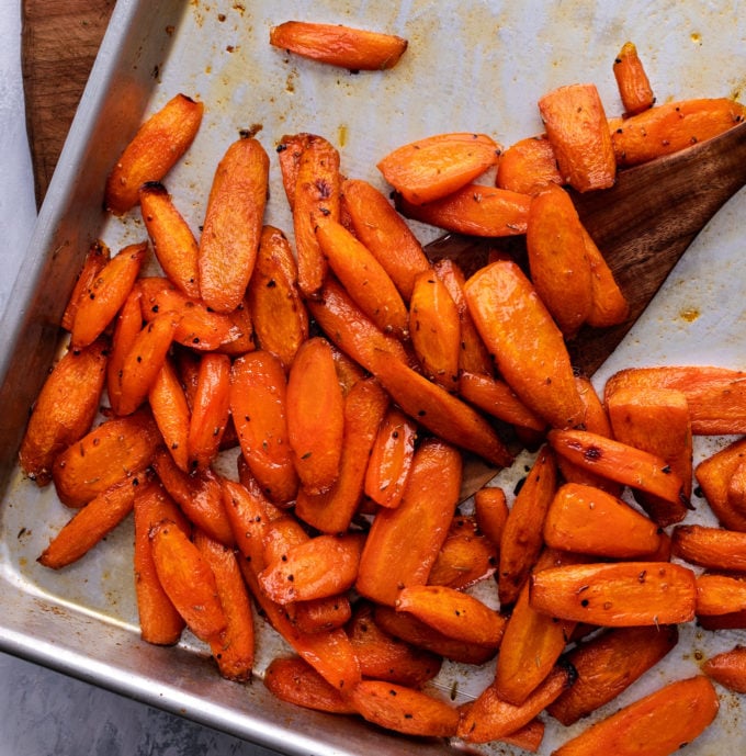 carrots on baking sheet with spatula