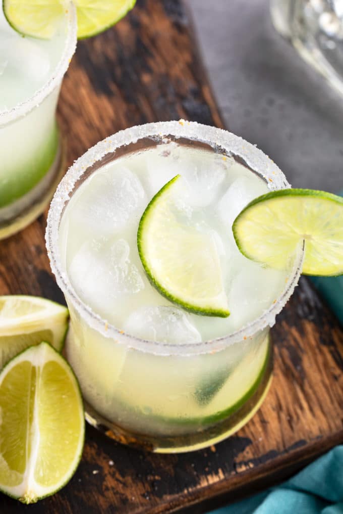 fresh margarita in glass with lime wedge