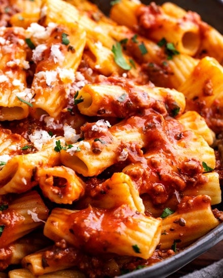 This Bolognese sauce recipe is hearty, rich and bursting with complex layers of flavor, and is on the table in 1 hour (instead of 2-3) thanks to the Instant Pot!  Pressure cook your way to an amazing Italian-style meal! #bolognese #meatsauce #spaghetti #italian #pasta #tomato #instantpot #pressurecooker #simmered