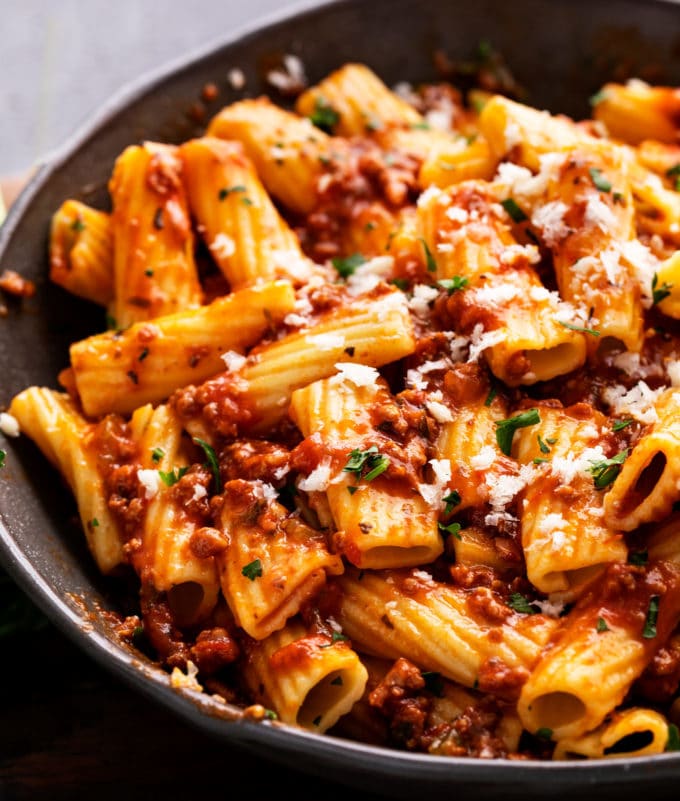 This Bolognese sauce recipe is hearty, rich and bursting with complex layers of flavor, and is on the table in 1 hour (instead of 2-3) thanks to the Instant Pot!  Pressure cook your way to an amazing Italian-style meal! #bolognese #meatsauce #spaghetti #italian #pasta #tomato #instantpot #pressurecooker #simmered