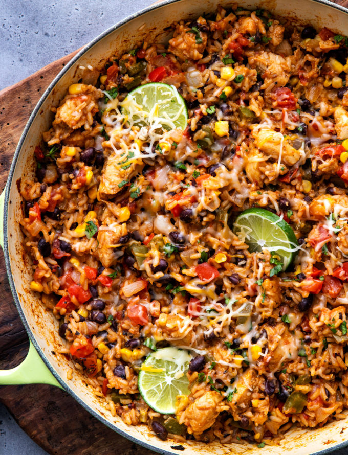 Made entirely in one pan, this Cheesy Southwest Chicken and Rice is bursting with powerful flavors, and ready in 45 minutes or less!  Plus plenty of prep-ahead tips to cut down on cooking time! #chicken #rice #southwest #mexican #fajita #onepan #onepot #easyrecipe #dinner #cooking