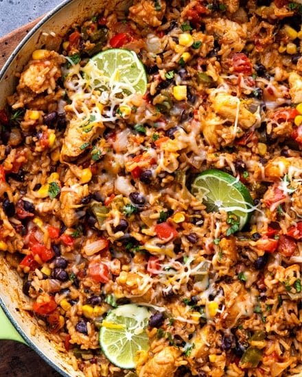 Made entirely in one pan, this Cheesy Southwest Chicken and Rice is bursting with powerful flavors, and ready in 45 minutes or less!  Plus plenty of prep-ahead tips to cut down on cooking time! #chicken #rice #southwest #mexican #fajita #onepan #onepot #easyrecipe #dinner #cooking