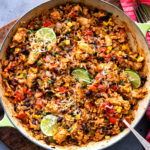 Made entirely in one pan, this Cheesy Southwest Chicken and Rice is bursting with powerful flavors, and ready in 45 minutes or less!  Plus plenty of prep-ahead tips to cut down on cooking time! #chicken #rice #southwest #mexican #fajita #onepan #onepot #easyrecipe #dinner #cooking