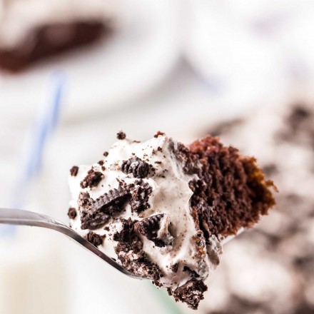 forkful of oreo poke cake