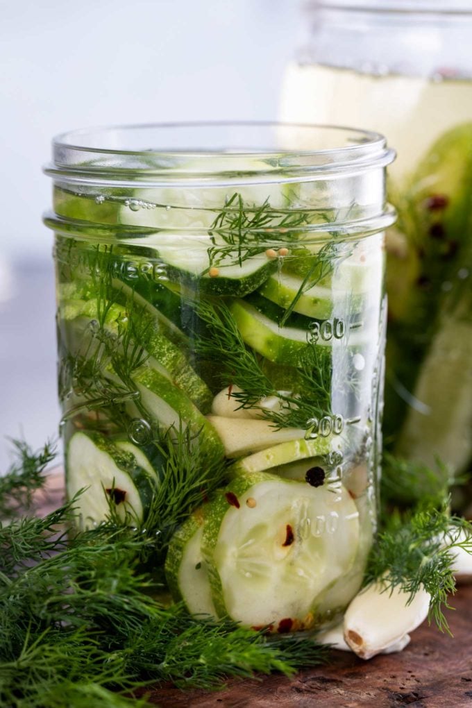 jar of dill pickles with brine