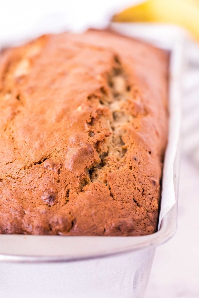 banana nut bread in white baking pan