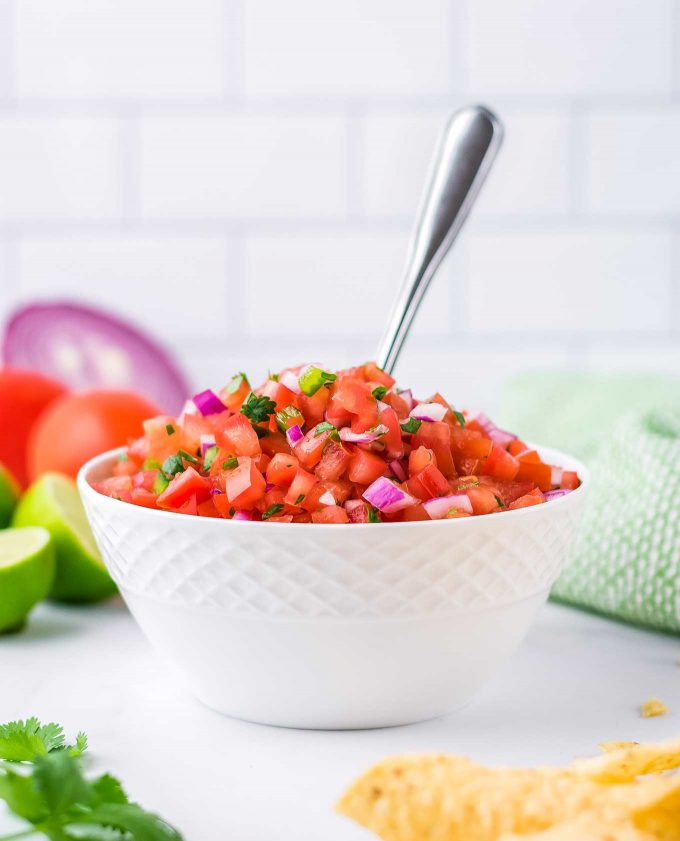 white bowl filled with pico de gallo 