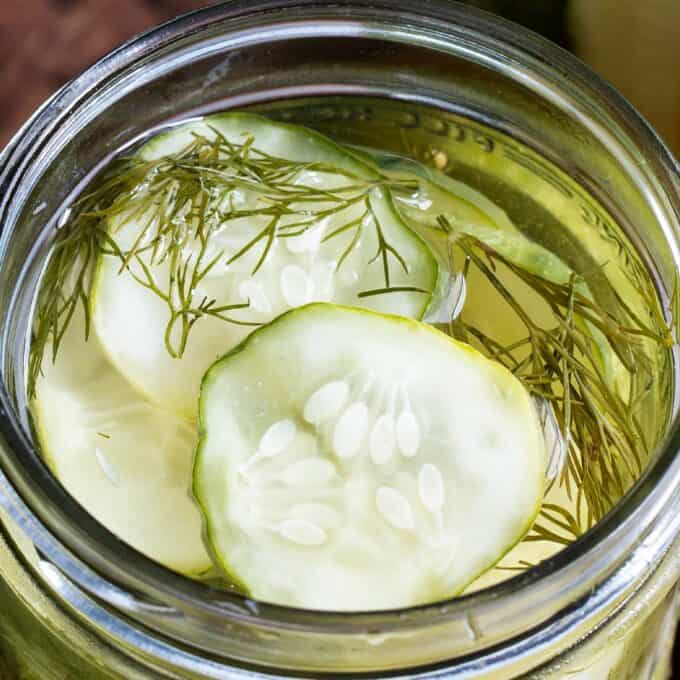 glass jar with dill pickles