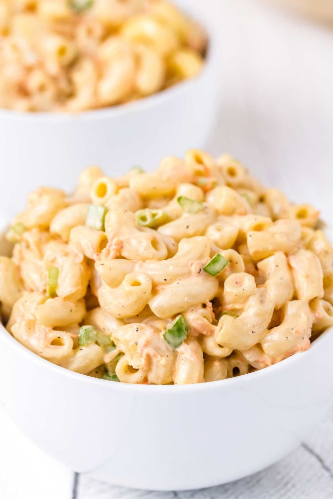 white bowl of macaroni salad