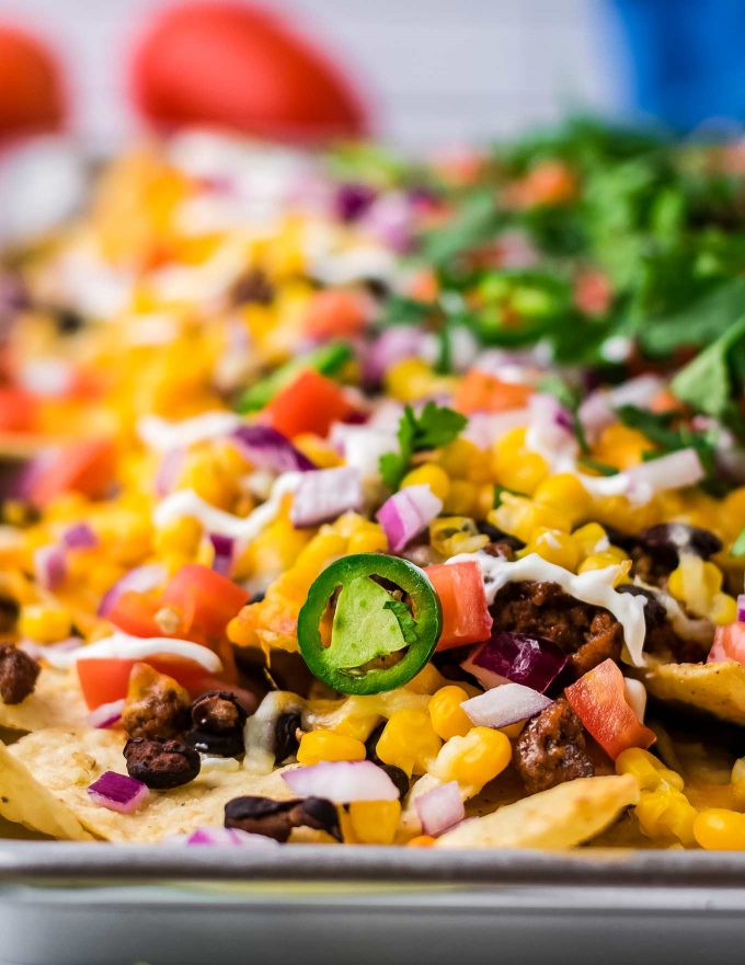 close up view of sheet pan nachos