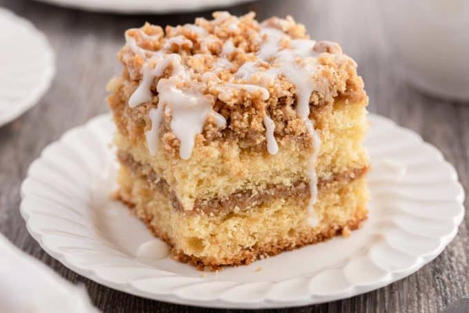 slice of coffee cake drizzled with glaze