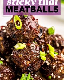 Tender baked meatballs loaded with fresh, bold, Thai flavors, smothered in a sticky sweet/savory sauce that is truly finger-lickin good!  Great over rice, in lettuce cups, or enjoyed with just a fork, they're the perfect party appetizer! #thai #meatballs #baked #asian #appetizer #partyfood