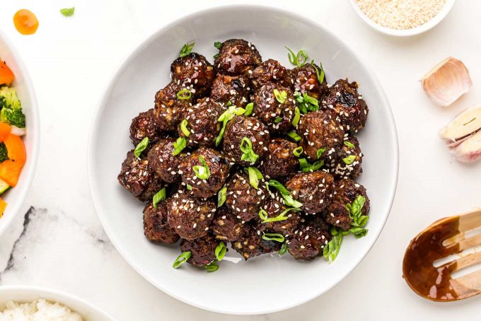 bowl of thai meatballs with green onions