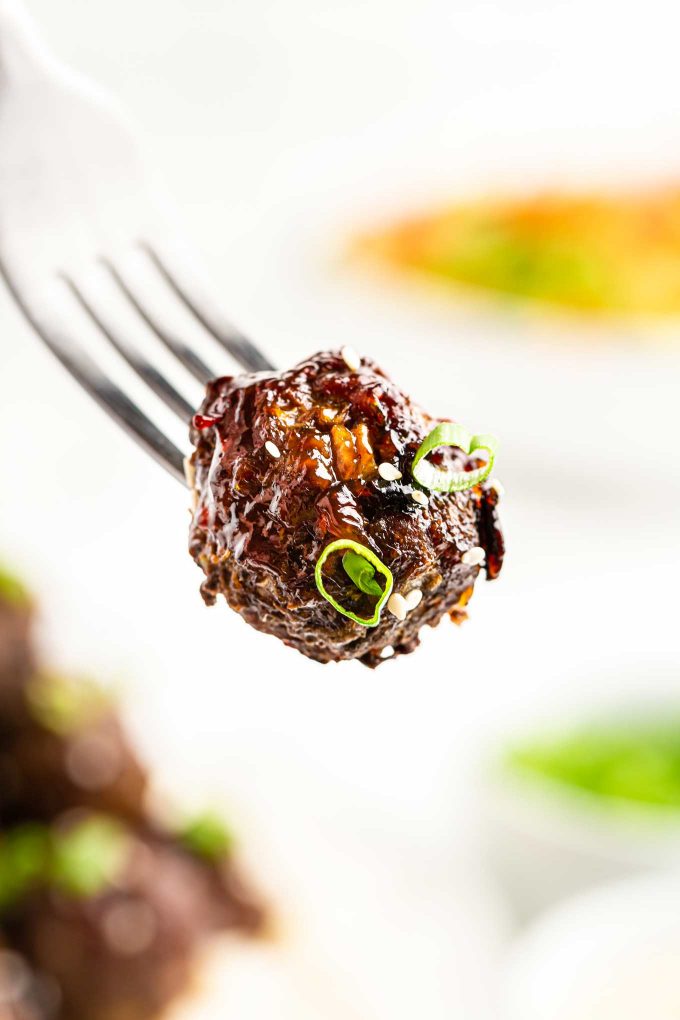 glazed thai meatball on fork