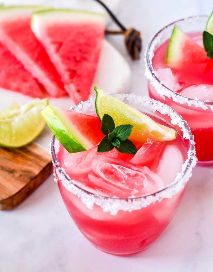 These Watermelon Margaritas are the ultimate refreshing summer drink!  Made with just 3 simple ingredients, you'll want a cocktail all summer long! #margaritas #margarita #watermelon #tequila #lime #fresh #melon #summerdrink #drink #cocktail