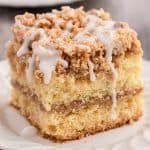 slice of glazed coffee cake on white plate