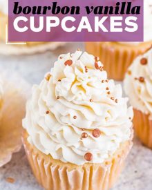 These Bourbon Vanilla Cupcakes are perfectly moist, and completely irresistible!  Light and fluffy cupcakes are spiked with bourbon and swirled with creamy vanilla buttercream for the ultimate dessert. #cupcakes #baking #dessert #vanilla #bourbon #fallbaking #dessertrecipe