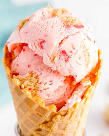 This homemade cherry cheesecake ice cream recipe is the perfect summer dessert made with rich cheesecake flavors, real pieces of maraschino cherries and graham crackers! #icecream #cherry #cheesecake #homemade #dessert #summer