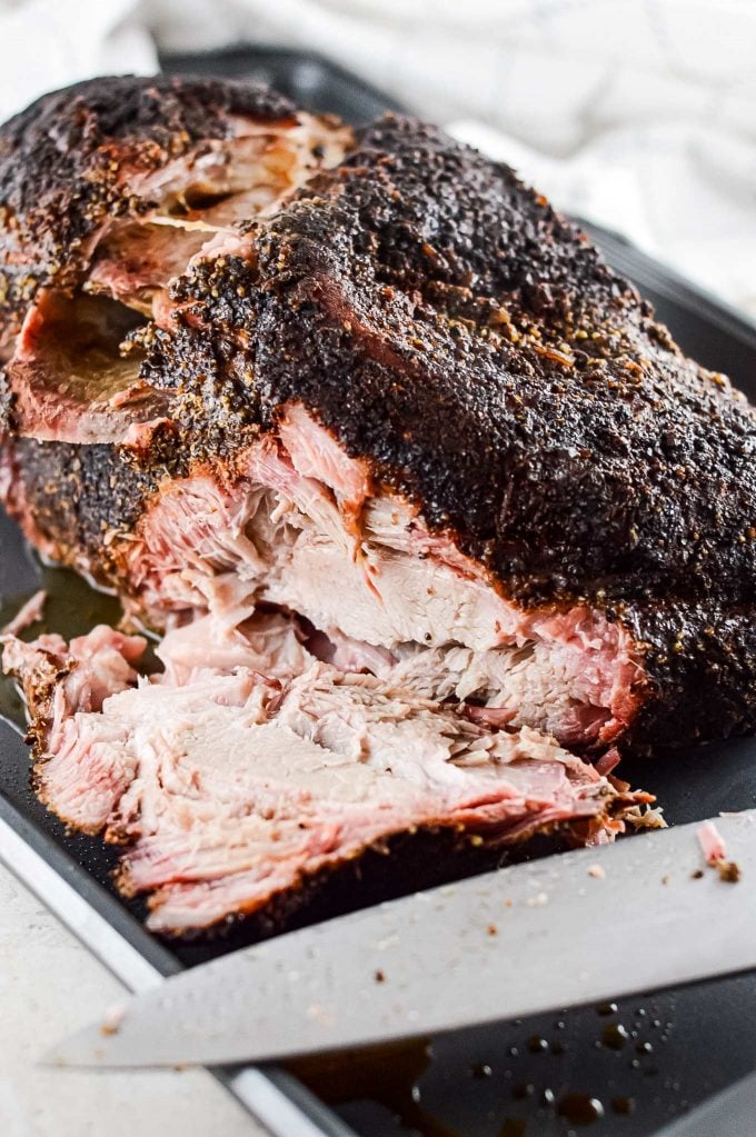Ultra flavorful and tender, this Pork Shoulder is smoked low and slow, and creates the most amazing, melt in your mouth pulled pork!ย Step by step how to smoke pork shoulder recipe.