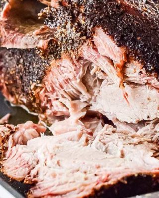 Ultra flavorful and tender, this Pork Shoulder is smoked low and slow, and creates the most amazing, melt in your mouth pulled pork! Step by step how to smoke pork shoulder recipe.