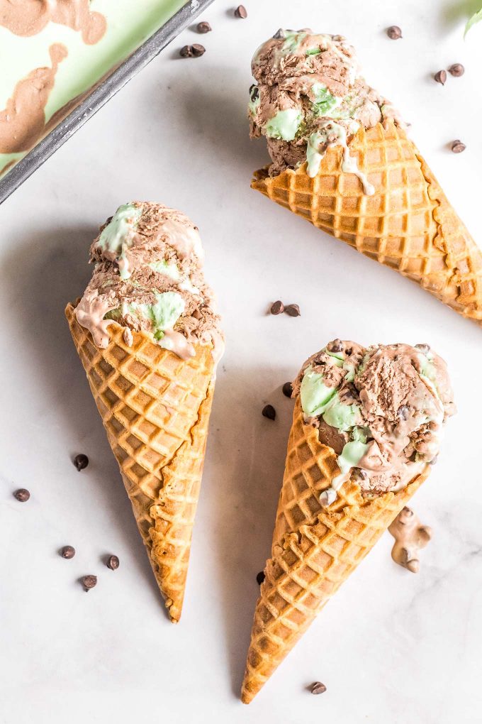 3 waffle cones full of mint chocolate ice cream