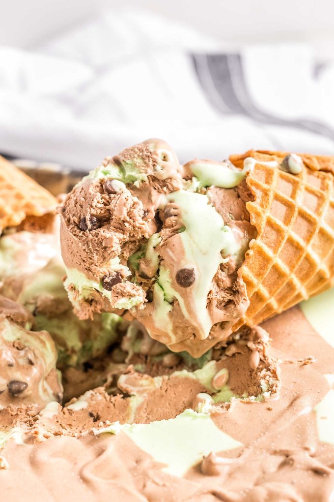 This chocolate mint ice cream is the perfect blend of sweet chocolate, icy mint, and silky creaminess.  Amazing homemade ice cream, made with NO ice cream maker, is the best dessert ever! #icecream #mint #chocolate #nochurn #dessert #sweets #frozen