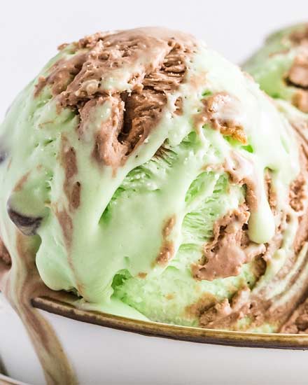 This chocolate mint ice cream is the perfect blend of sweet chocolate, icy mint, and silky creaminess.  Amazing homemade ice cream, made with NO ice cream maker, is the best dessert ever! #icecream #mint #chocolate #nochurn #dessert #sweets #frozen